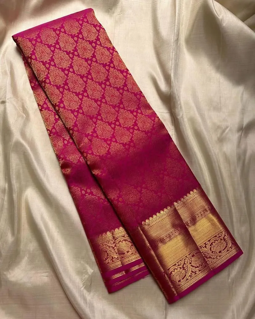 Ornate Dark Pink Soft Silk Saree With Exquisite Blouse Piece